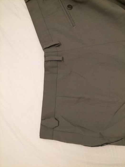 Calças Emidio Tucci, marcas de uso nas fotografias