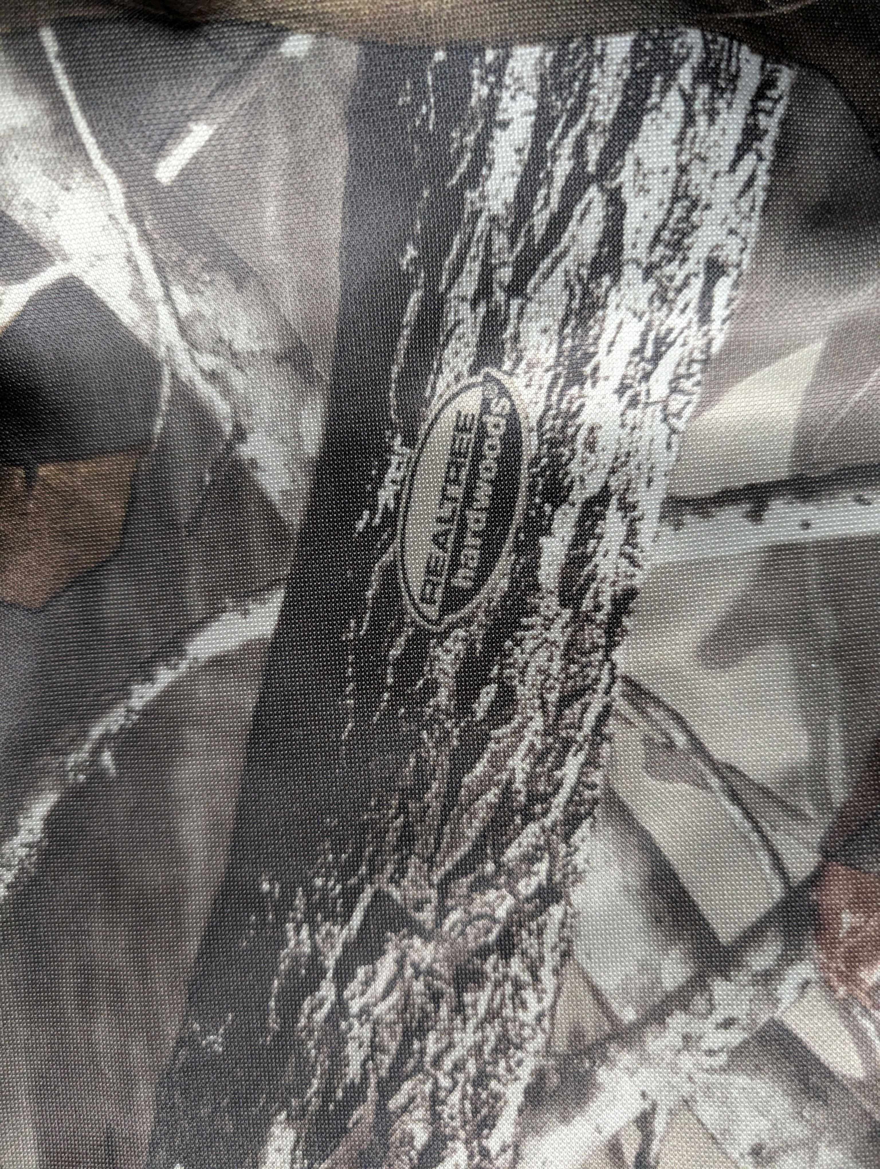Spodnie myśliwskie w kamuflażu RealTree