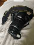 Nikon D3100 z torbą, obiektywem i oryginalnym pudełkiem