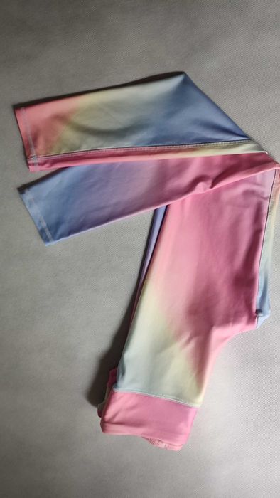 Dziewczęce legginsy sportowe fitness elastyczne kolorowe pastelowe
