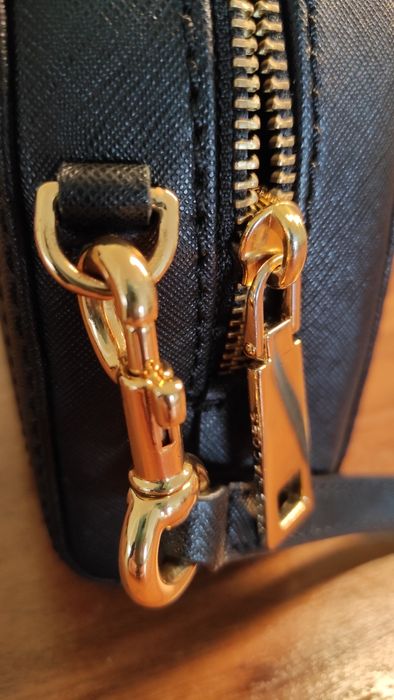 Mala Marc Jacobs de pele como nova