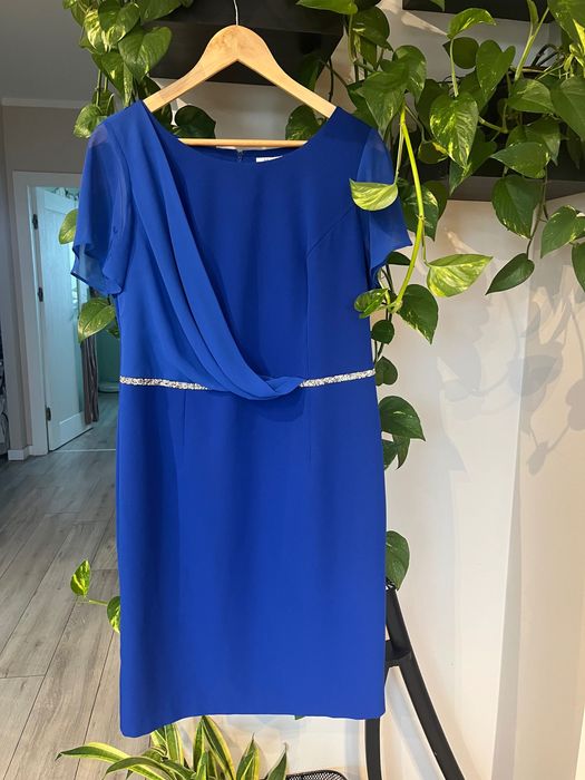 Niebieska sukienka wizytowa