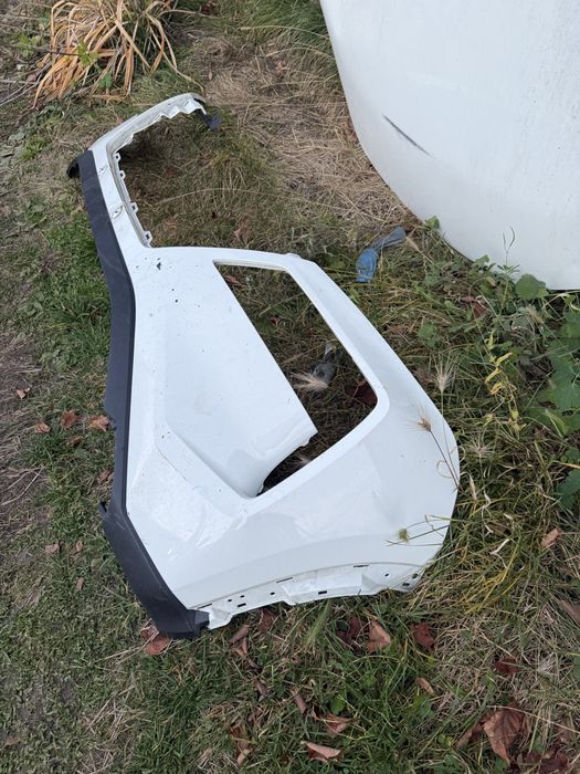 Передний бампер Nissan Rogue T33 дорест левая часть