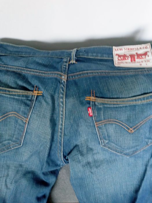 Jeansy meskie granat slim Levis Strause 30\34WL