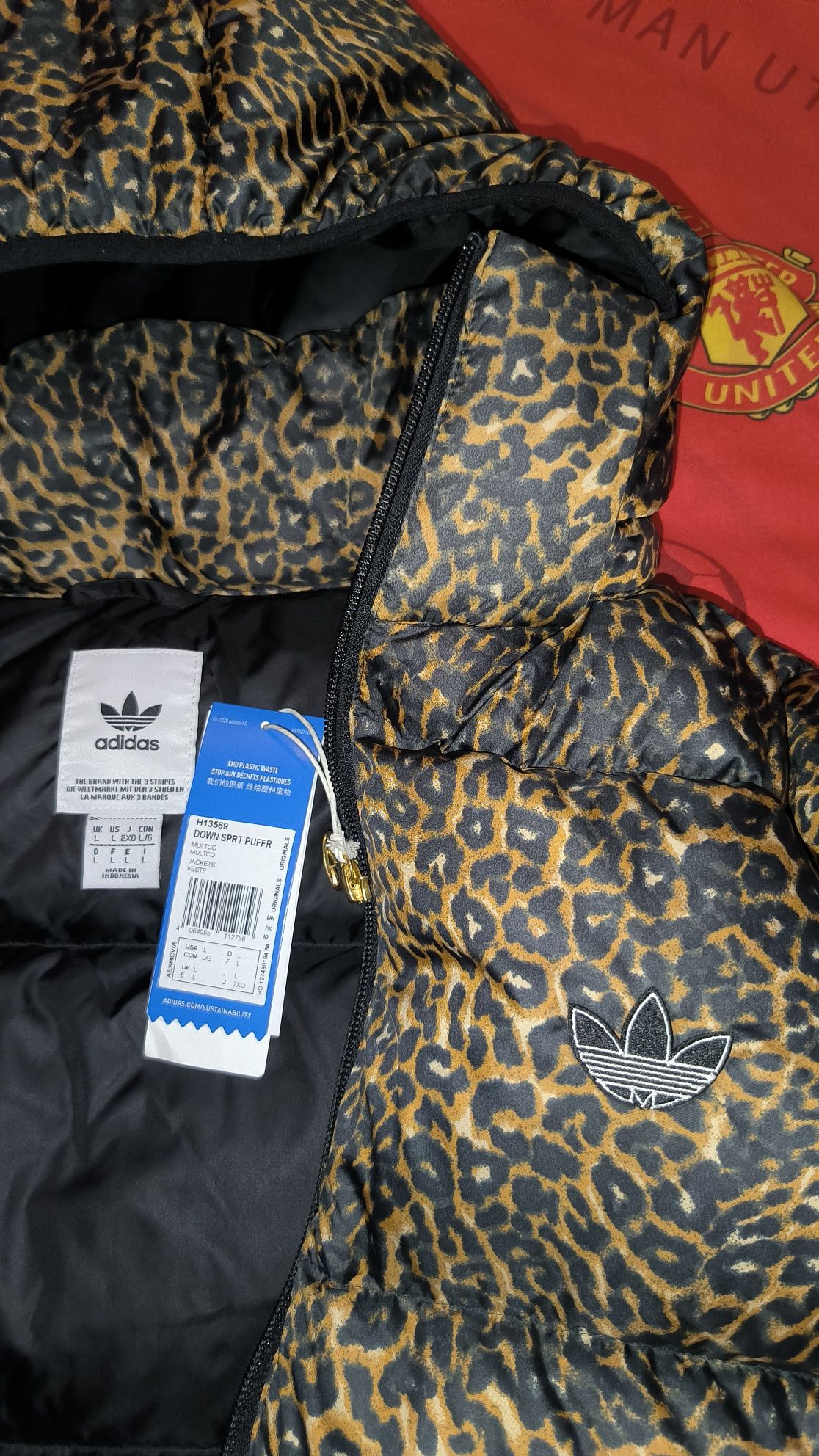 Продам редкий мужский пуховик adidas