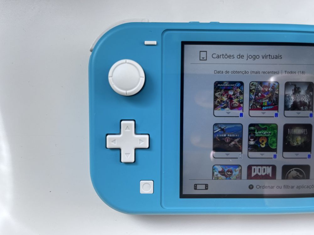 Nintendo Switch Lite Turquesa + 18 jogos digitais