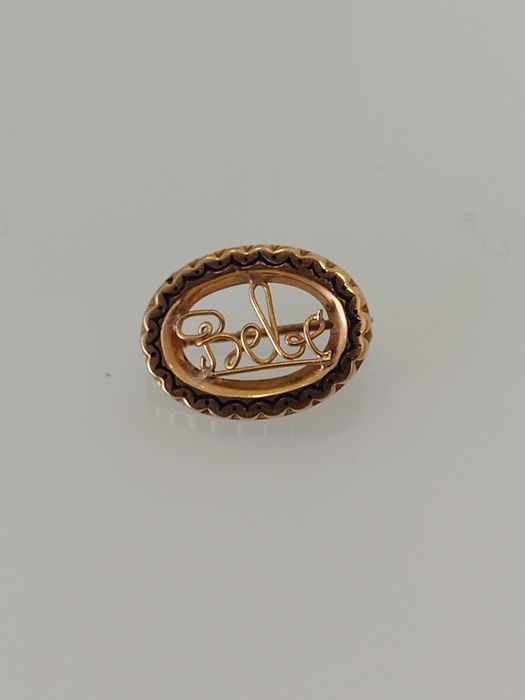 Pregadeira em ouro de 19,2kt