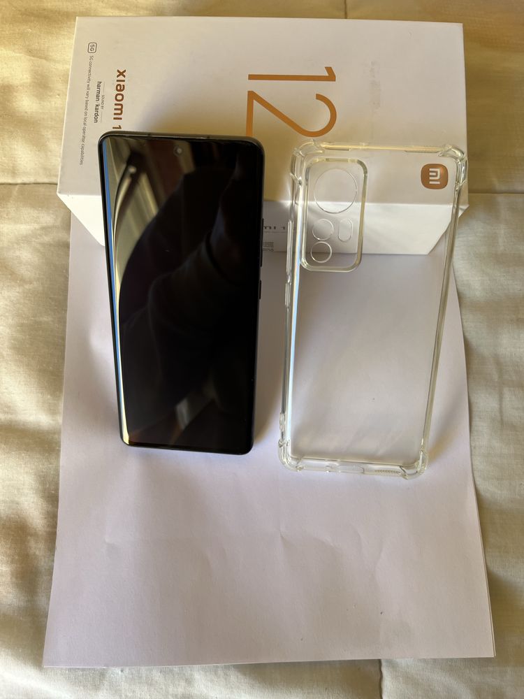 Xiaomi Redmi Note 12 128gb W/ Charger and cell phone cover