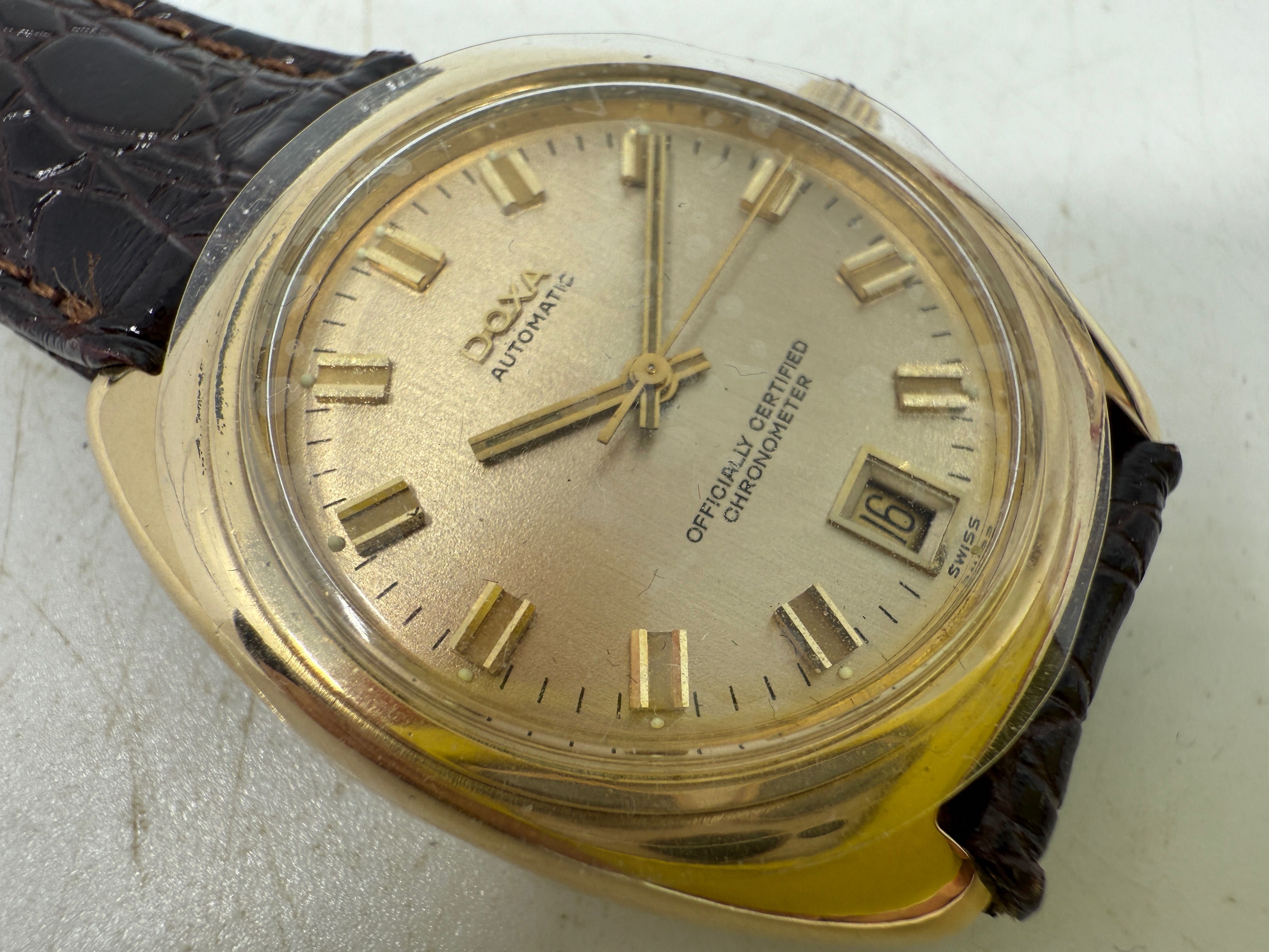 Złoty zegarek Doxa automatic złoto próba 750
