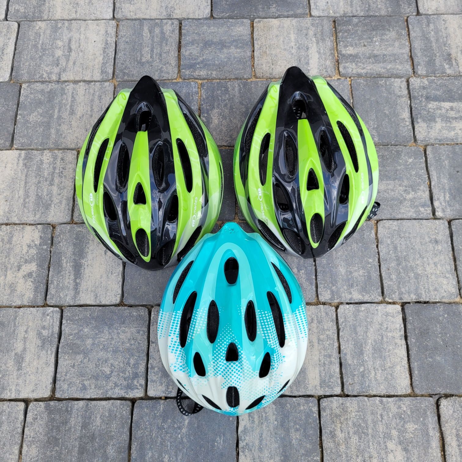 Trzy kaski rowerowe Martens