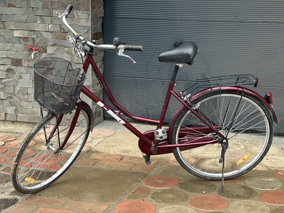 Дамський велосипед з кошаром — зручно, красиво, практично
