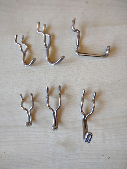 Ganchos de suporte para painel perfurado