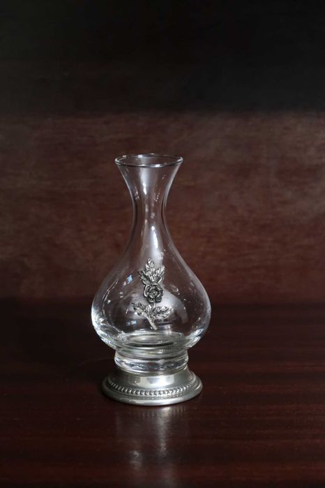 Frasco com aplicações em estanho