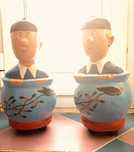Tintins de origem artesanal em madeira