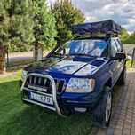 Samochód terenowy na wynajem Jeep grand cherokee WJ z namiotem