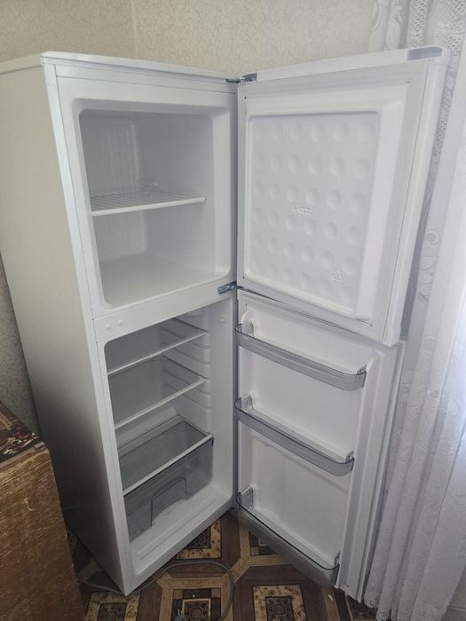 Холодильник новий