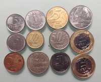 Conjunto de moedas de real, centavo de real e cruzeiro