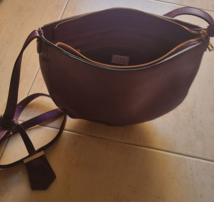 Mala formato meia lua