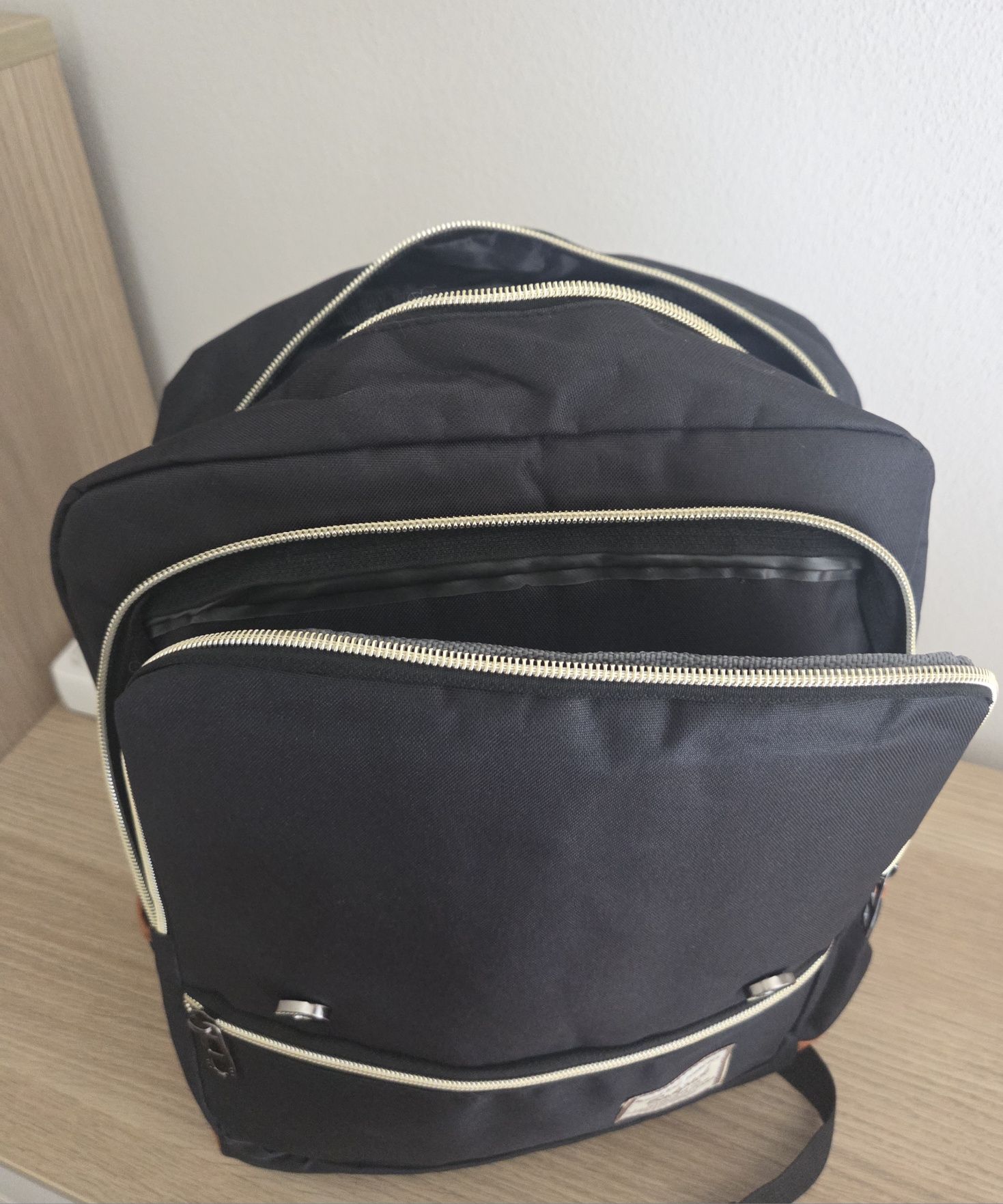 Mochila unisexo + acessórios