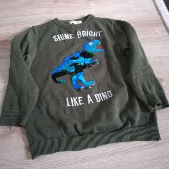 Sweterek chłopięcy H&M z hologramowym dinozaurem r. 122/128