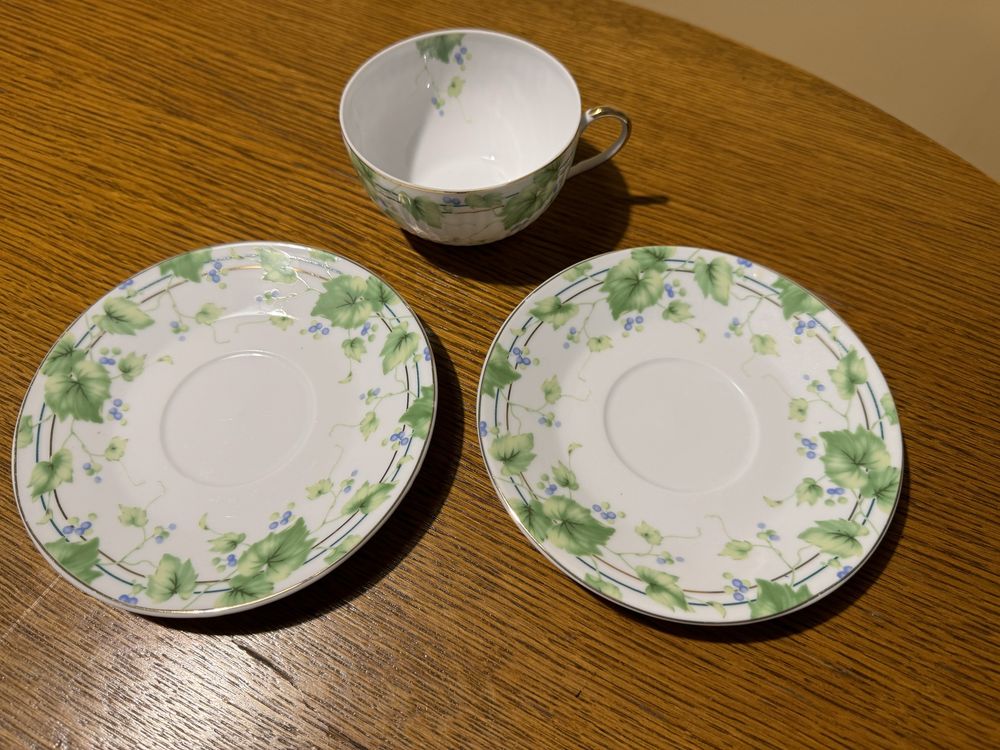 Pozłacana porcelana / Filiżanka + dwa podstawki / Calido Viento