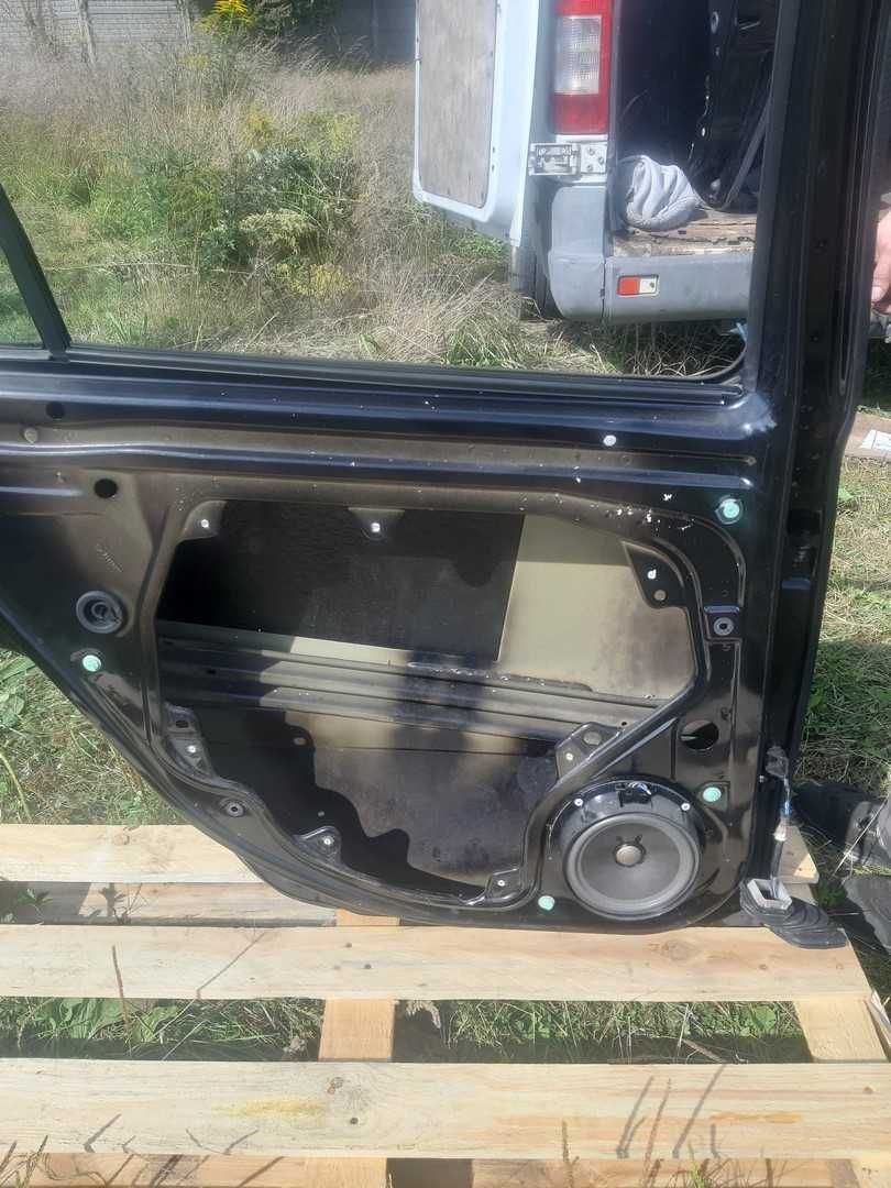Skoda Octavia II Kombi drzwi lewe lewy tył 9910