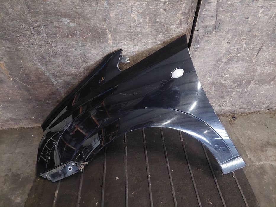 BŁOTNIK LEWY PRZÓD OPEL MERIVA A Z20R