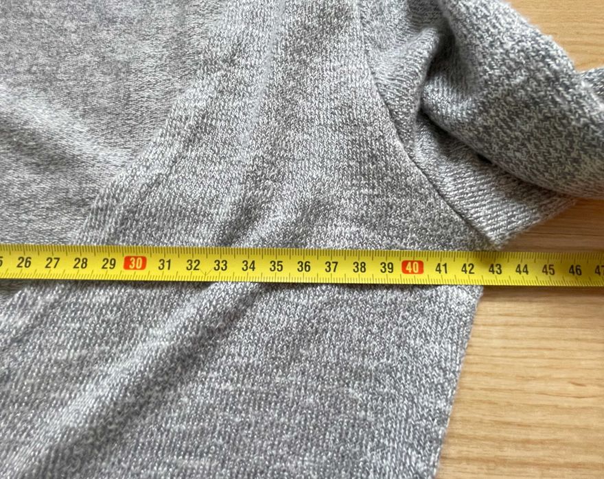 Kopertowa sukienka o asymetrycznym kroju