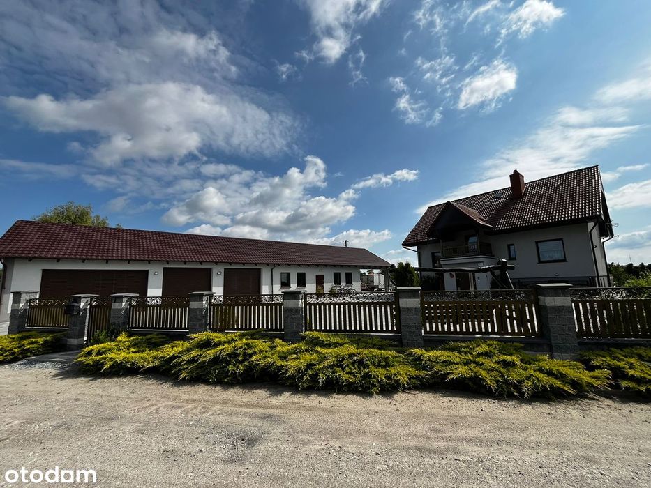 Dom z dużą działką, garażem na 5 samochodów i budynkiem gospodarczym
