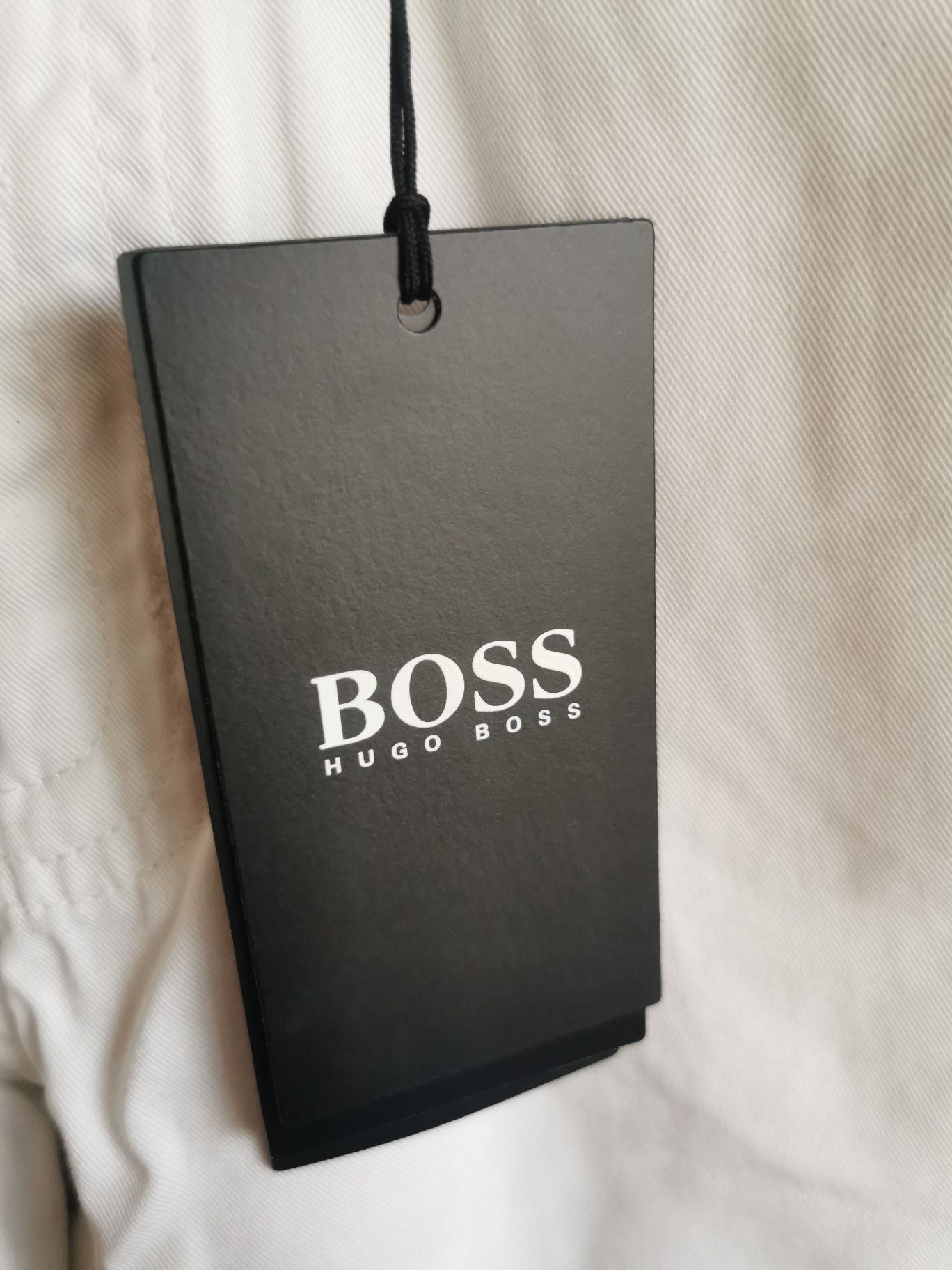 Białe męskie spodnie Hugo Boss 34/34