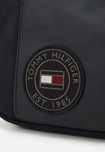 Tommy Hilfiger listonoszka torebka oryginalna unisex