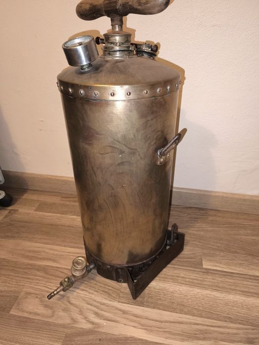 Pulverizador antigo em latão.
