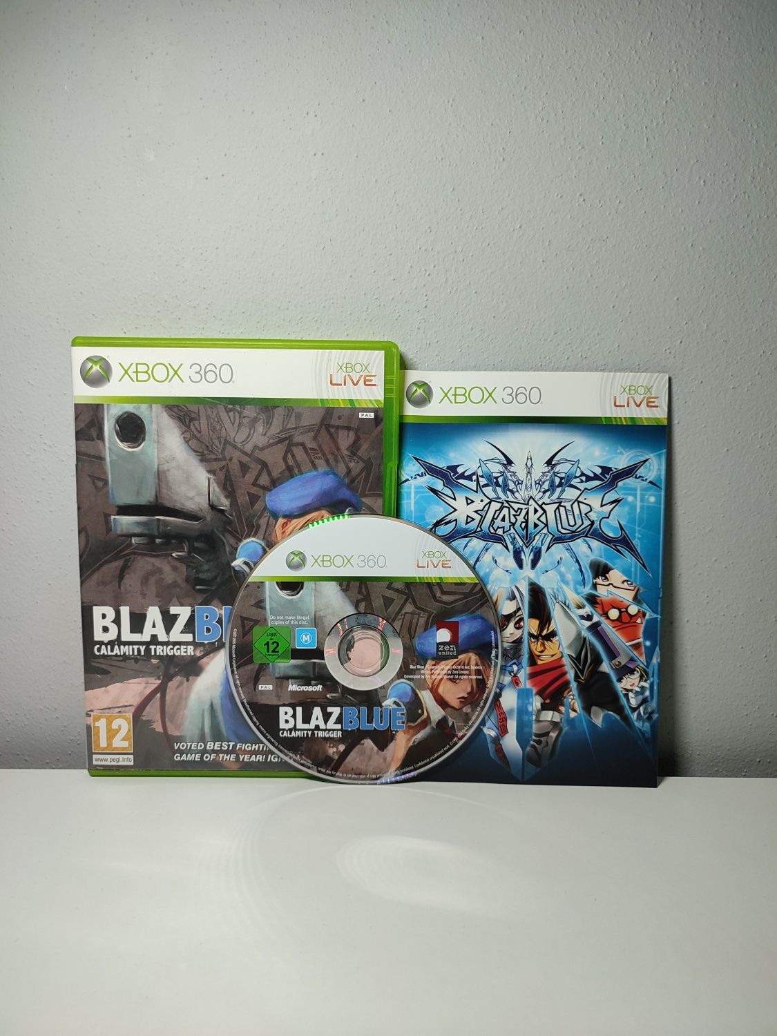 BlazBlue: Calamity Trigger (Jak nowa, Unikat) - Gra Xbox 360