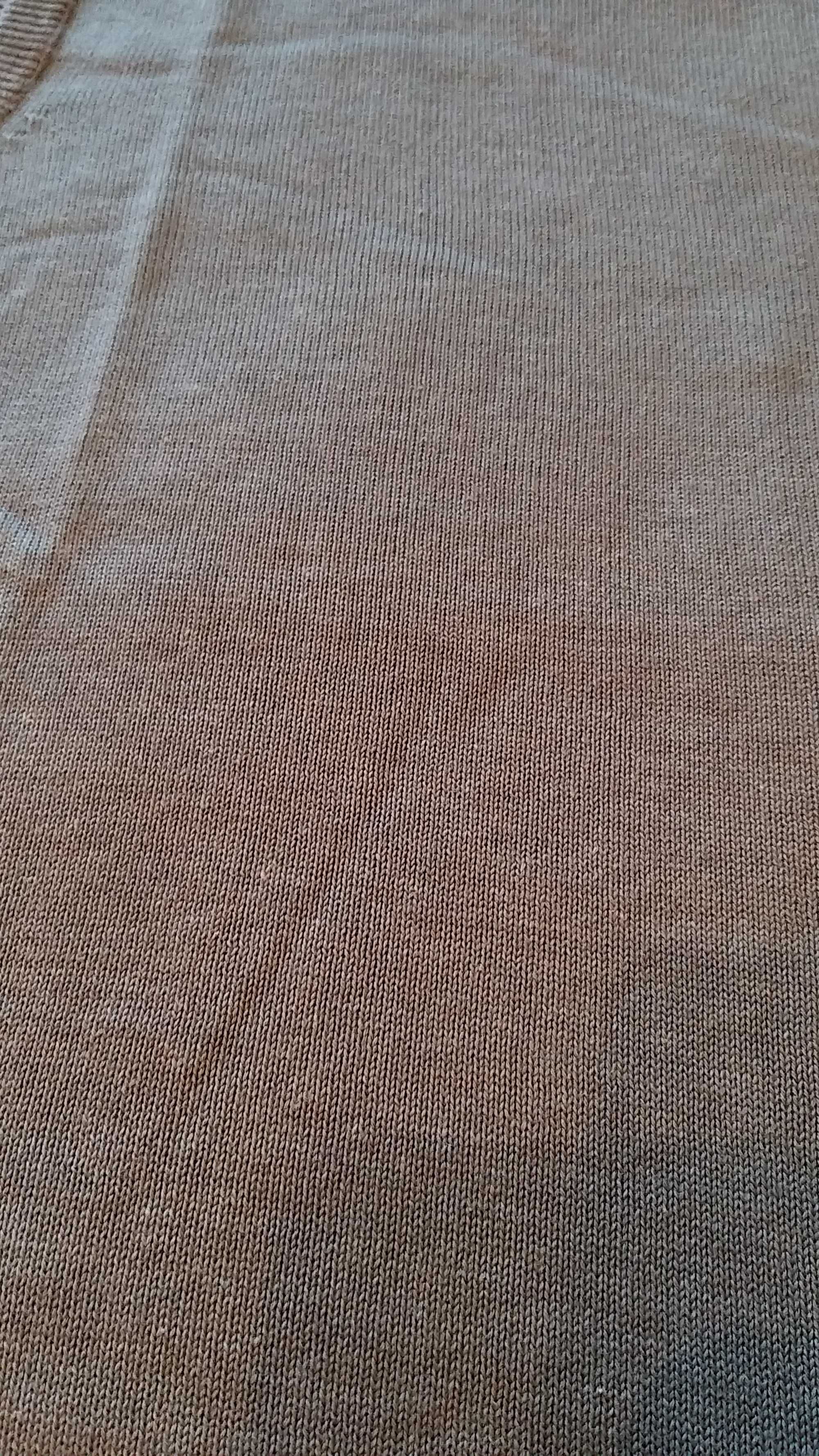 Colete de malha sem mangas com decote em V