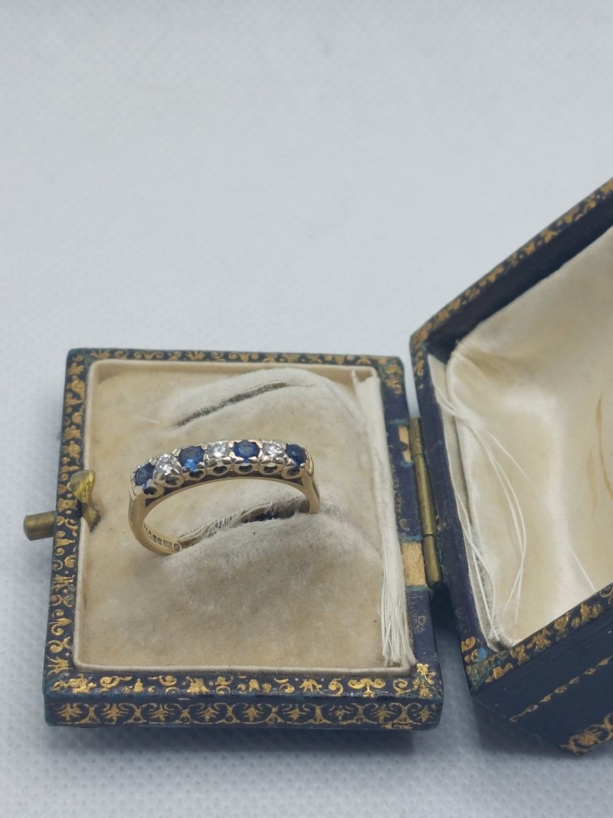 Złoty pierścionek 375 9 diamenty brylanty szafiry certyfikat obrączka