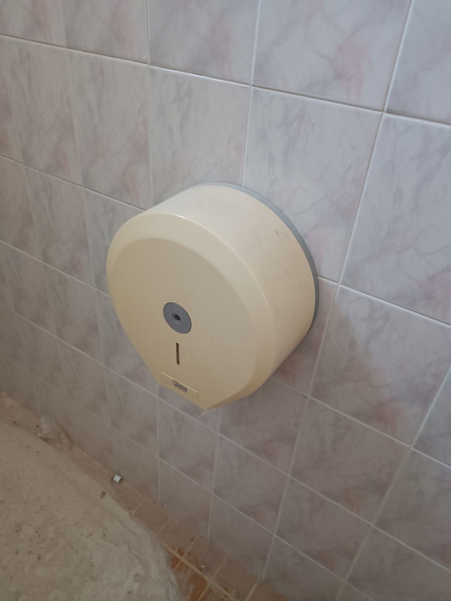 Dispensador de papel e líquido