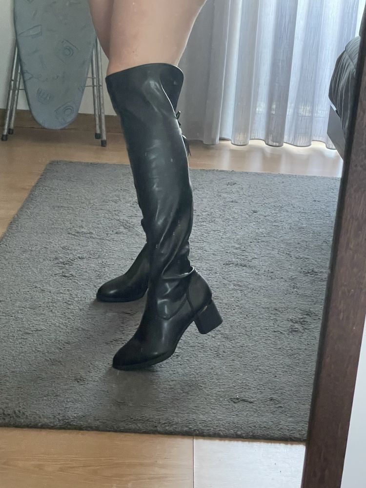 Botas acima do joelho