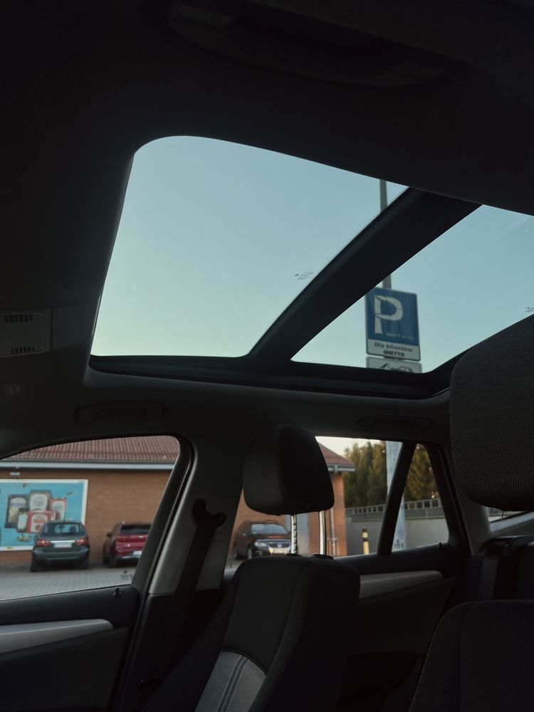 BMW X1 2012 automat naped 4x4 panoramiczny dach czarny