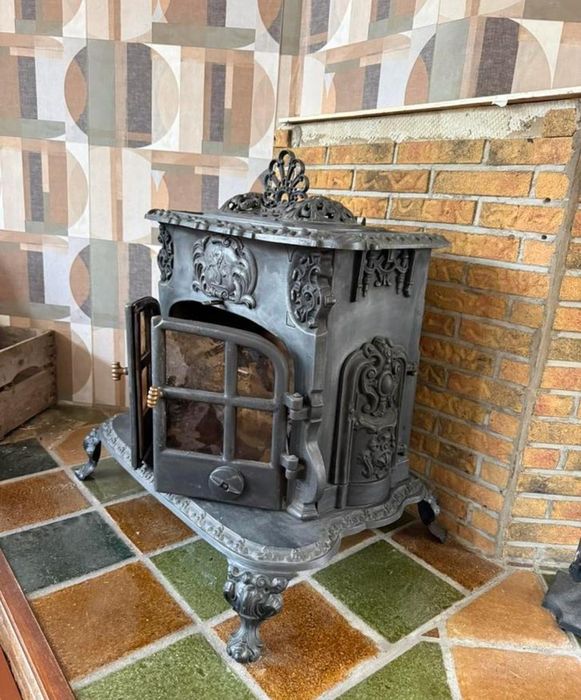 Kominek żeliwny wolnostojący