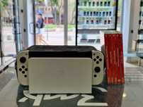 Nintendo Switch OLED 64GB Białe Joy-cony/ 5 gier/ Grade A/ GW 6msc