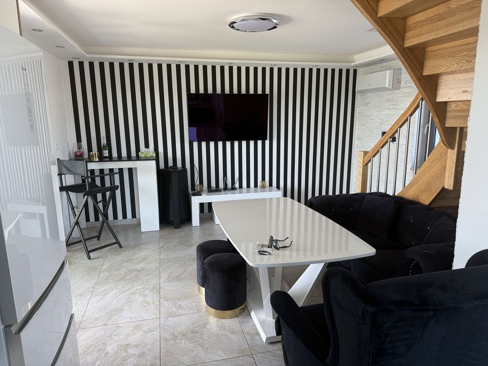 Domek nad jeziorem z jacuzzi, solarium, linia brzegową, sauna, plaża
