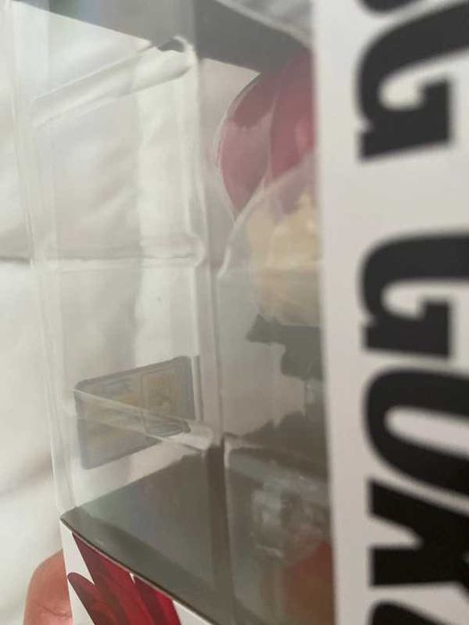 Funko SSG Goku 826 com sticker SDCC