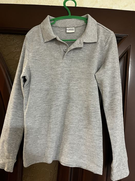 Продам б/в поло на хлопчика до школи