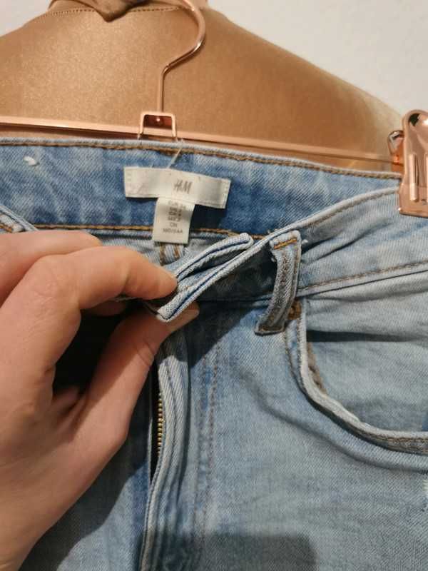 Jeansy z prostą nogawką i przetarciami H&M rozmiar 34