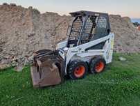 Miniładowarka Bobcat 443 z krokodylem i łyżką kubota