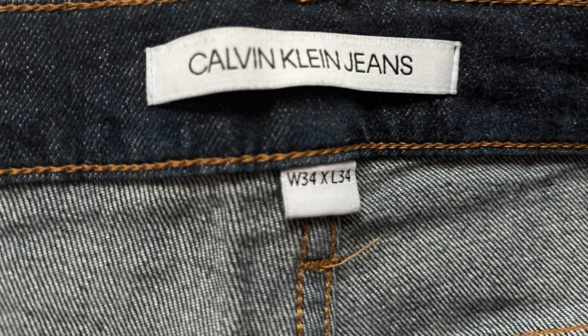 Granatowe jeansy Calvin Klein rozmiar 34/34 98% bawełna