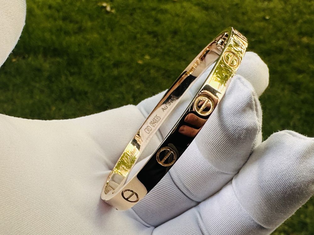 Золотой браслет cartier 585