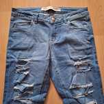 Spodnie damskie jeansy z dziurami 36 S