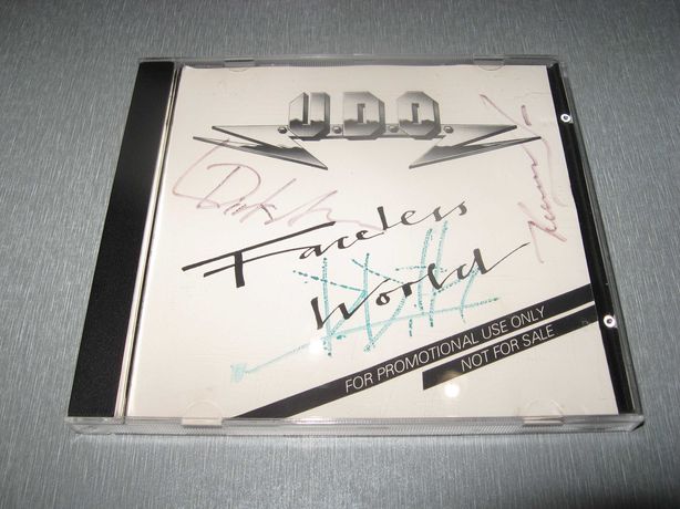 U.D.O. *Faceless World* фирменный CD сингл с автографами музыкантов