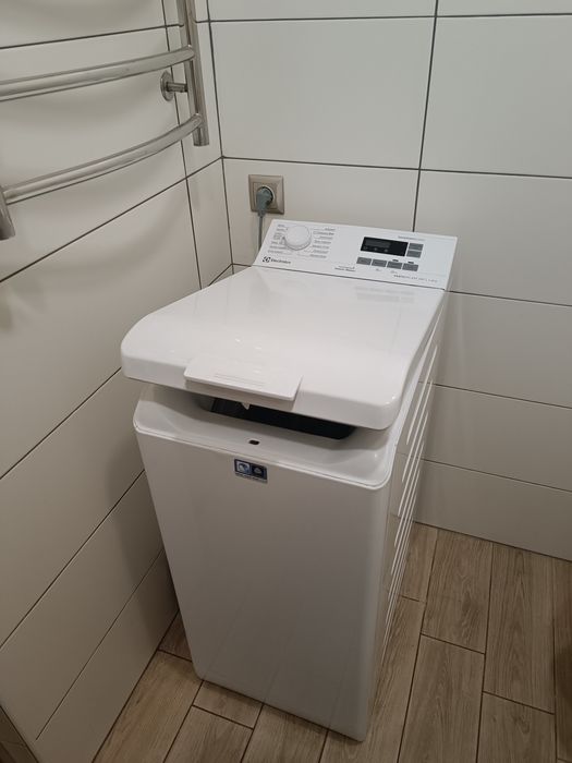 Electrolux PerfectCare 600 Пральна машина з вертикальним завантаженням